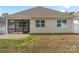 House exterior showcasing screened porch and brick patio at 2491 Seagull Dr, Denver, NC 28037