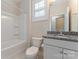 Clean bathroom with granite countertop vanity and shower/tub combo at 2491 Seagull Dr, Denver, NC 28037