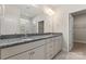 Elegant bathroom with double vanity, granite countertop, and large walk-in shower at 2491 Seagull Dr, Denver, NC 28037