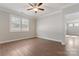 Bright bedroom with hardwood floors and window shutters at 2491 Seagull Dr, Denver, NC 28037