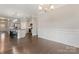 Bright dining room with hardwood floors and wainscoting at 2491 Seagull Dr, Denver, NC 28037