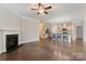 Open living room with hardwood floors and a fireplace at 2491 Seagull Dr, Denver, NC 28037