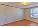 Bright bedroom featuring wood-look floors and a window at 3586 Bridle Path Dr, Vale, NC 28168