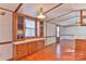 Dining area with built-in hutch and wood flooring at 3586 Bridle Path Dr, Vale, NC 28168