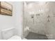 Elegant shower with marble tile and glass enclosure at 40242 Crooked Stick Dr # 1198, Lancaster, SC 29720