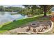 Lakefront fire pit area with seating and landscaping at 4455 Reed Creek Dr # 102, Sherrills Ford, NC 28673