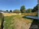 Large, fenced backyard offers privacy and space for outdoor activities and entertaining at 613 Buffalo St, Shelby, NC 28150