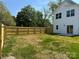 Spacious backyard with new fence, perfect for pets, play, and outdoor entertainment at 613 Buffalo St, Shelby, NC 28150