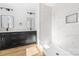 Bathroom featuring a double sink vanity, modern fixtures, and glass enclosed shower at 613 Buffalo St, Shelby, NC 28150