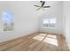 Bright bedroom with vaulted ceilings, hardwood style floors, and natural light at 613 Buffalo St, Shelby, NC 28150