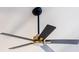 Contemporary ceiling fan with black blades and gold accents, adding style to the room at 613 Buffalo St, Shelby, NC 28150