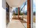 Cozy front porch with wooden columns and view of the front yard at 613 Buffalo St, Shelby, NC 28150