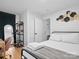 Bright bedroom with hardwood floors, a comfortable bed, and decorative wall art at 724 Finley Rd, Rock Hill, SC 29730