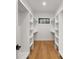 Large walk-in closet with ample shelving and hanging space at 10614 Arlington Church Rd, Charlotte, NC 28227