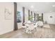 Open concept dining area with view into the living room at 108 Elwood St, Kannapolis, NC 28081