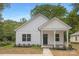 Charming white house with a welcoming front porch at 108 Elwood St, Kannapolis, NC 28081