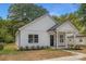 Modern white house with a welcoming front porch at 108 Elwood St, Kannapolis, NC 28081