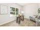 Home office featuring a writing desk and comfortable chair at 108 Elwood St, Kannapolis, NC 28081