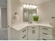 Bathroom featuring modern vanity, white countertops and a framed mirror at 1304 Pleasant Plains Rd, Matthews, NC 28105