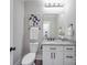 A stylish half bathroom showcasing a modern vanity, granite countertop, and elegant fixtures for guests at 1304 Pleasant Plains Rd, Matthews, NC 28105