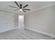 Bedroom with neutral walls, carpet flooring, and a ceiling fan at 1304 Pleasant Plains Rd, Matthews, NC 28105