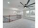 Bonus room features a ceiling fan, natural light, with neutral carpeting at 1304 Pleasant Plains Rd, Matthews, NC 28105