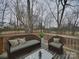 Wooden deck furnished with outdoor seating, perfect for relaxation and enjoying the outdoors at 1304 Pleasant Plains Rd, Matthews, NC 28105
