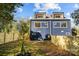 Back of house showcasing modern design and fenced yard at 137 S Smallwood Pl, Charlotte, NC 28208