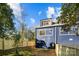 Side view of house with modern exterior and fenced yard at 137 S Smallwood Pl, Charlotte, NC 28208