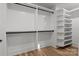 Large walk-in closet with hanging rods and shelving at 137 S Smallwood Pl, Charlotte, NC 28208