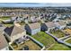 Aerial view of houses and backyards in a neighborhood at 137 Yellow Birch Loop, Mooresville, NC 28117