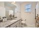 Clean bathroom with granite countertops and a walk-in shower at 137 Yellow Birch Loop, Mooresville, NC 28117