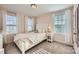 Bright bedroom with light walls and window coverings at 137 Yellow Birch Loop, Mooresville, NC 28117