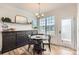 Bright breakfast nook features a round table and chairs, perfect for enjoying morning meals at 137 Yellow Birch Loop, Mooresville, NC 28117