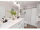 Double vanity bathroom with a shower/tub combo and white cabinets at 1823 Bristol Rd, Statesville, NC 28677