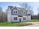 Two-story home with gray siding, a front yard, and driveway at 1823 Bristol Rd, Statesville, NC 28677