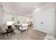 Bright and airy living room with hardwood floors and white doors at 1823 Bristol Rd, Statesville, NC 28677