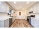 Updated kitchen with stainless steel appliances and light gray cabinets at 2400 Caswell Ct, Gastonia, NC 28054