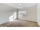 Bright bedroom with neutral walls and carpeting at 3028 Semmes Ln, Indian Trail, NC 28079