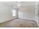 Spacious bedroom with neutral decor and carpeting at 3028 Semmes Ln, Indian Trail, NC 28079