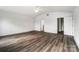 Bonus room with vaulted ceilings, wood-look floors, and neutral paint at 3028 Semmes Ln, Indian Trail, NC 28079