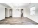 Formal dining room with hardwood floors and a chandelier at 3028 Semmes Ln, Indian Trail, NC 28079