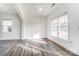 Living room with hardwood floors and large windows at 3028 Semmes Ln, Indian Trail, NC 28079