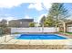 Relaxing in-ground pool with a concrete deck at 3028 Semmes Ln, Indian Trail, NC 28079