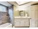 Bright bathroom with a corner vanity and shower/tub combo at 3335 Knob Hill Ct, Charlotte, NC 28210