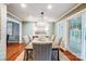 Bright dining room with a wood table and chandelier at 3335 Knob Hill Ct, Charlotte, NC 28210