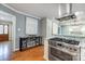 Updated kitchen with stainless steel appliances and a wine rack at 3335 Knob Hill Ct, Charlotte, NC 28210