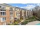 Complex of townhouses with pool and city skyline view at 3957 Picasso Ct, Charlotte, NC 28205