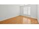 Bright bedroom with hardwood floors and window blinds at 3957 Picasso Ct, Charlotte, NC 28205