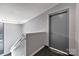 Interior hallway with gray door and carpeted floor at 3957 Picasso Ct, Charlotte, NC 28205